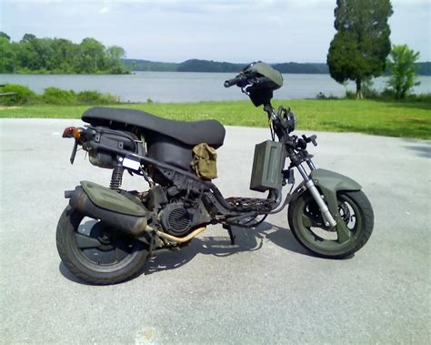 Naked Streetfighters Motorcycle Parked By Water S Edge