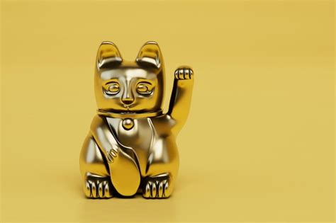 Maneki neko aislado sobre fondo amarillo gato de la suerte japonés