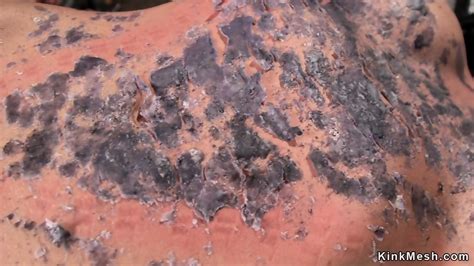 Waxed Blonde Whipped In Device Bondage