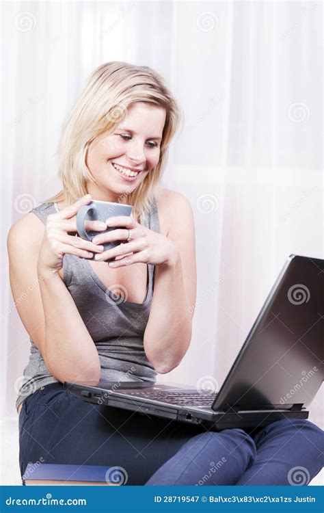 Beautiful Blonde Woman In Her Apartment Over The Internet Stock Image Image Of Beautiful