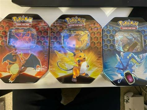 Mavin Pokemon Hidden Fates Set Of 3 Tins SEALED Charizard Gyarados