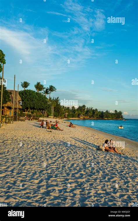 Matira Point beach at sunset, Bora Bora, French Polynesia Stock Photo ...