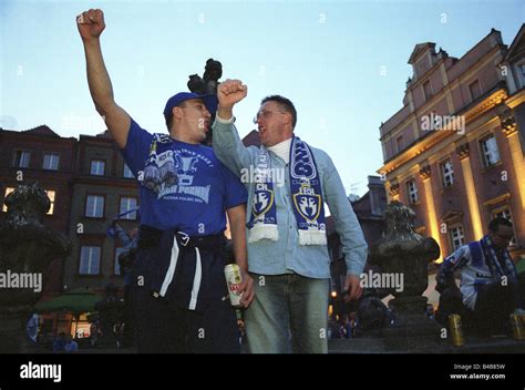 Football Fans Of Lech Poznan Celebrating In The Old Market Square