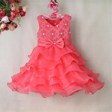 Buy Beautiful And Unique Peach Colored Wedding Dress For Cute Baby Girl