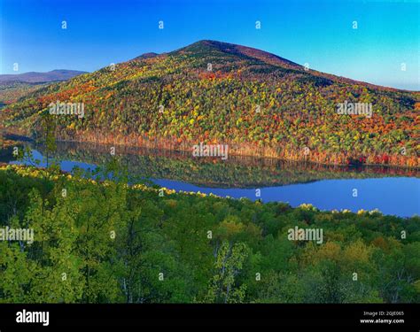 Landscape of Traveler Mountain and South Branch Pond, fall foliage ...