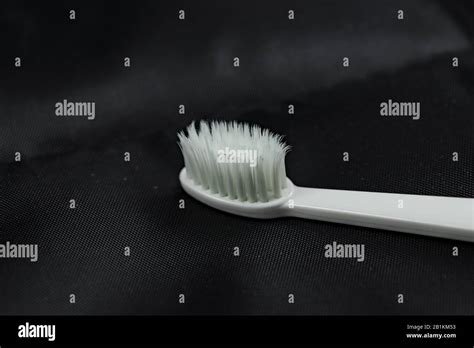 Toothbrush With White Bristles Stock Photo Alamy