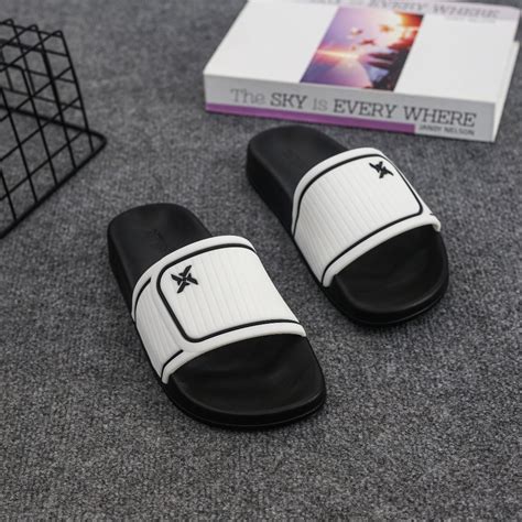 Dép nam nữ quai giả vân xé dan logo XT YOFEET nhiều màu hot trend XB