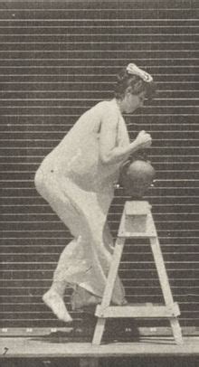 File Semi Nude Woman Bending To Fill A Water Jar Placing It On Head Rbm QP301M8 1887 216a 8