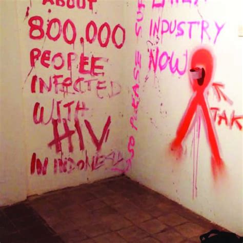 HIV graffiti wall with interactive condom distribution cup. | Download ...