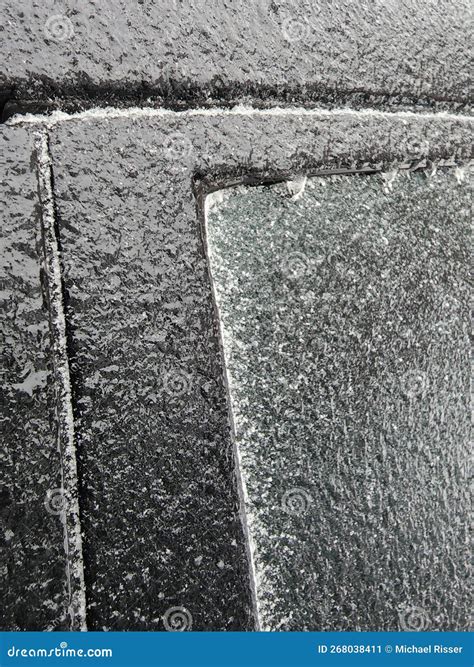 Frozen Rain Ice and Sleet on a Black Vehicle Stock Image - Image of