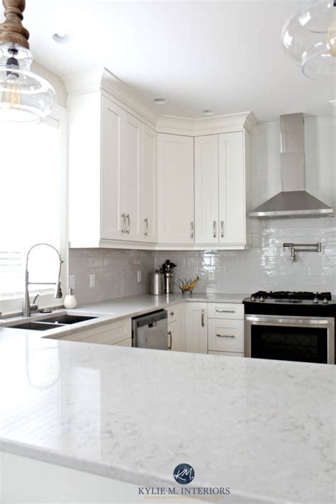 Low contrast white kitchen with Bianco Drift quartz countertops and ...