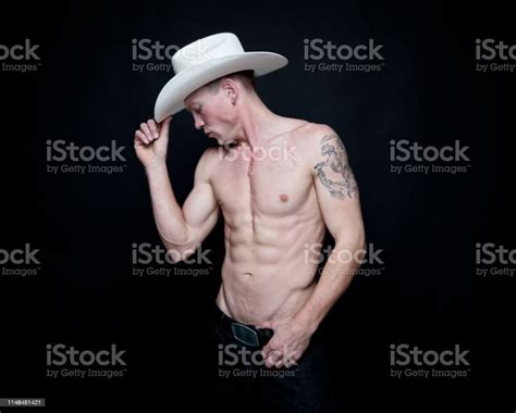 Attractive Cowboy With A White Cowboy Hat Stock Photo - Download Image ...