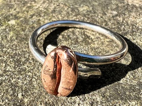 Adjustable Coffee Bean Ring In Sterling Silver And A Red Bronze Bean