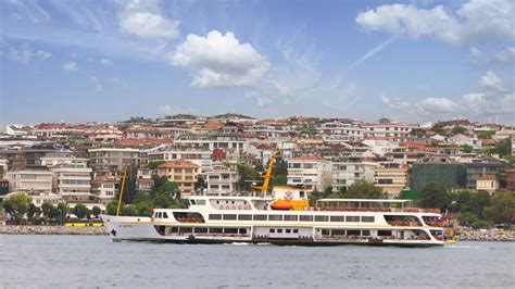 Modern Ferry Boat Sailing In Bosphorus Strait With Galata Tower In The