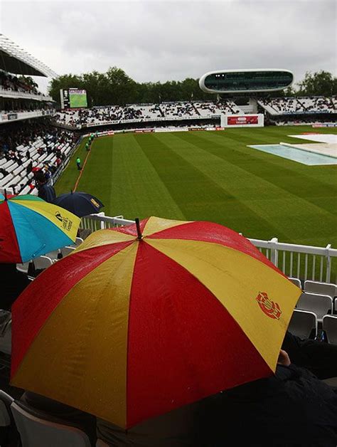 An MCC Umbrella Provides The Only Splash Of Colour On A Drab Day At