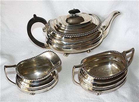 Lot A George V Three Piece Silver Tea Service William Hutton Sons