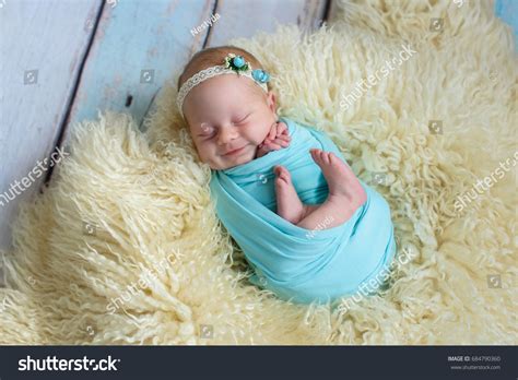 Adorable Smiling Newborn Baby Girl Sleeping Stock Photo 684790360