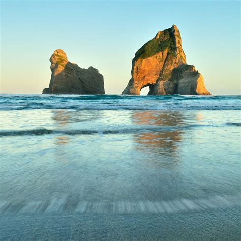 Archway Islands Sunrise Wharariki Beach New Zealand Mike Isaak