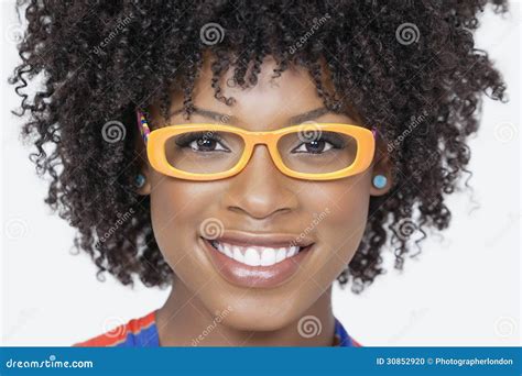 Close Up Portrait Of An African American Woman Wearing Glasses Over