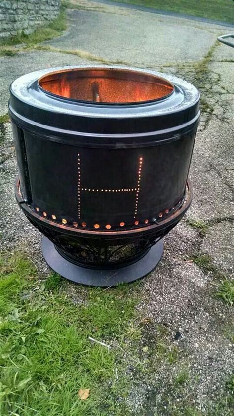 Fire pit made from a recycled drum from an old dryer. My brother