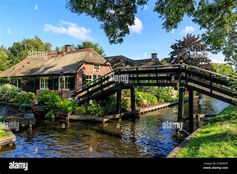 Panoramiv View Of The Water Canal And Traditional Dutch Brick Houses In