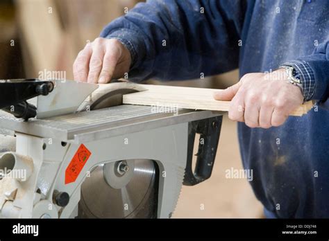 Carpenter Cutting Wood With Electrical Saw Wood Carpentry Stock Photo