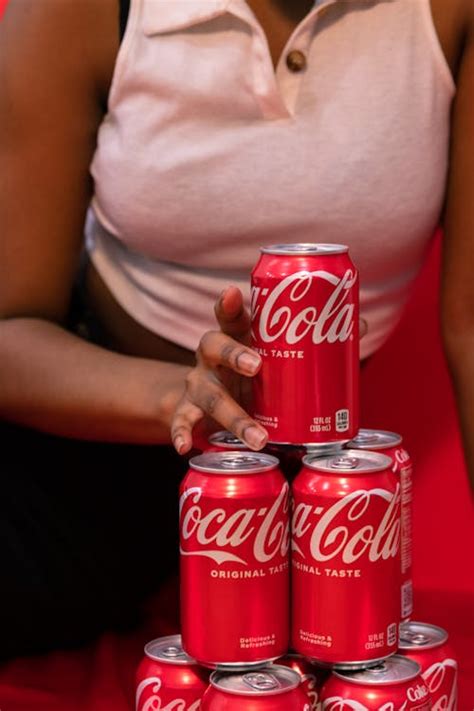 Person Holding Coca Cola Can · Free Stock Photo