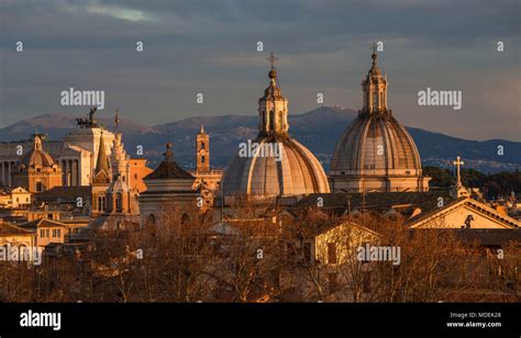 View Of Rome Historic Center At Sunset With Baroque Domes And