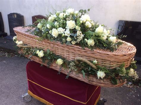 White Rose And Freesia Wicker Coffin Garland And Spray Funeral Flowers