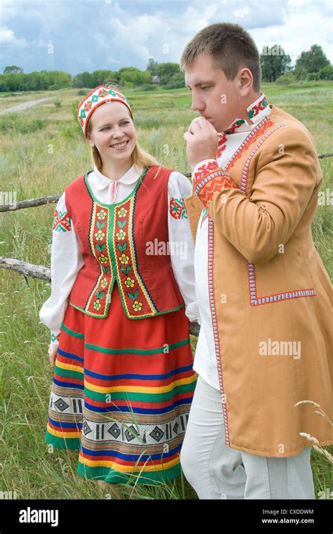 Young man and woman in national dress of the Belarus Stock Photo - Alamy