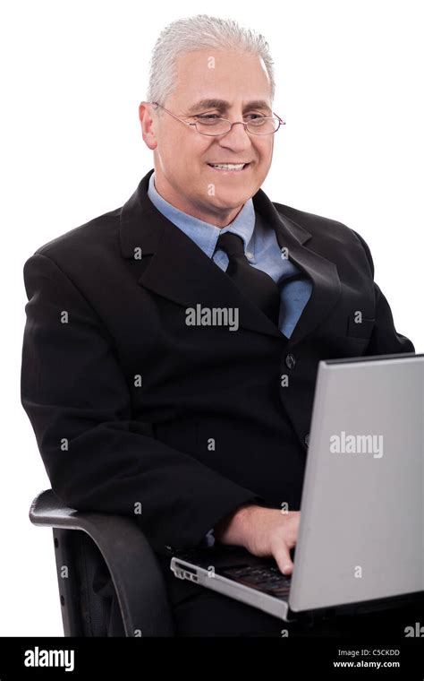 Mature Business Man In Working With Laptop On White Background Stock Photo Alamy