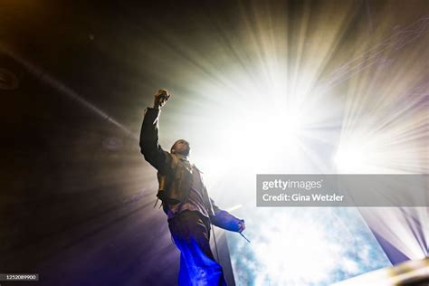 Canadian Singer Daniel Caesar Performs Live On Stage During A Concert