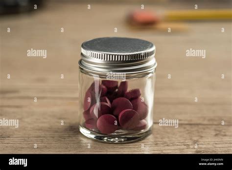 Iron Supplement Pills In Glass And Metal Container Stock Photo Alamy