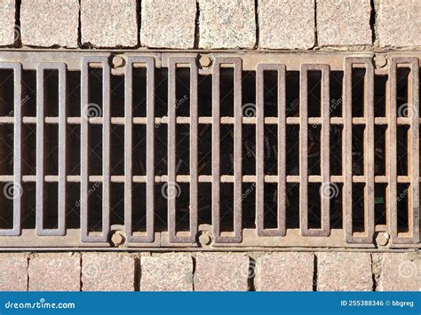 City Street Brown Old Rusty Metal Iron Gutter Gray Drain Grate For