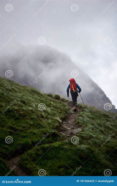 Male Hiker Walking Uphill In Mountains Stock Image Image Of Climber