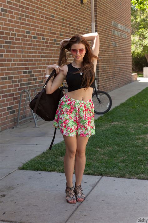 Brunette Chick In A Floral Skirt Demonstrat XXX Dessert Picture 1