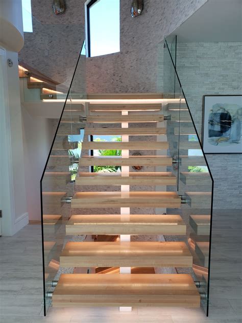 Free Standing Floating Staircase With Glass Railing And Led Illuminated