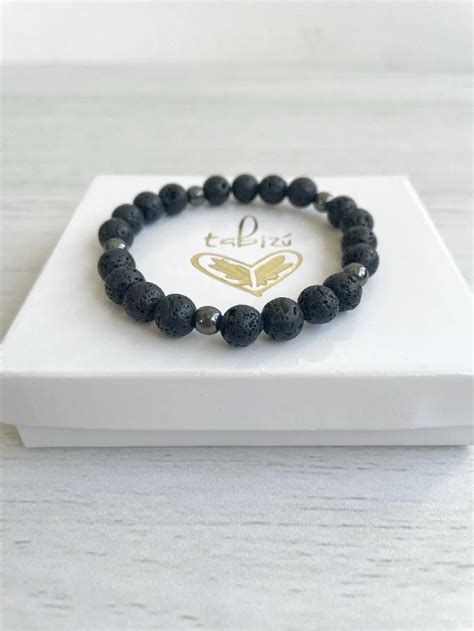 Pulsera piedra volcánica y hematite Tabizú