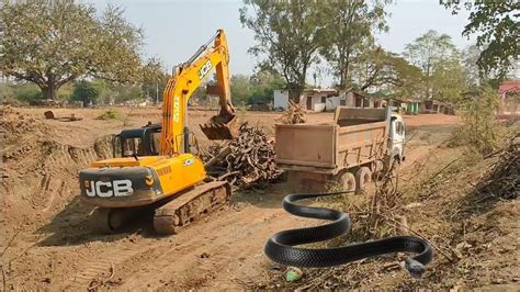 Jcb Excavator Backhoe Fully Loading Mud In Pulling Tata Ex Truck