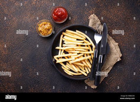 French Fries With Tomato Sauce And Mustard Top View Stock Photo Alamy