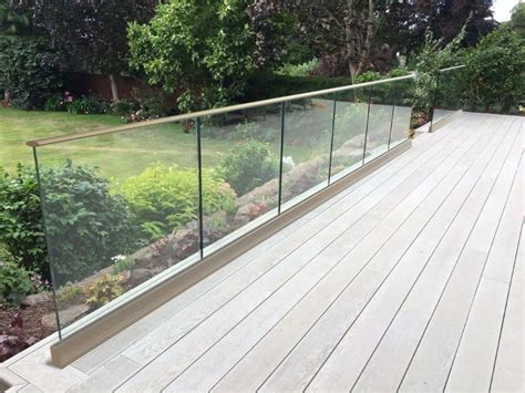 Sg12 Frameless System With Top Rail Ablove Floor Level Patio Railing