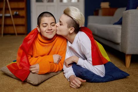 Loving Lesbian Couple Posing Together With Rainbow Multicolored Flag Stock Image Image Of