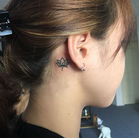 Flower Behind Ear Tattoo