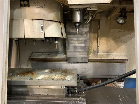 Daewoo DMV 4020D VMC, 2003- Chip Conveyor, Pallet Changer - Revelation