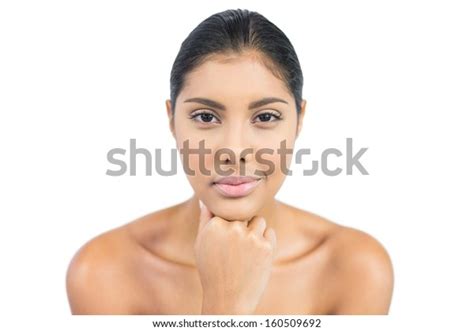 Peaceful Nude Brunette Touching Her Chin Stock Photo