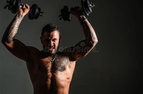Muscular Guy Doing Exercises With Dumbbell Sporty Man Working Out Muscular Naked Male Torso