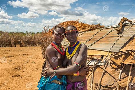 Two Sisters From The African Tribe Daasanach In Their Village E