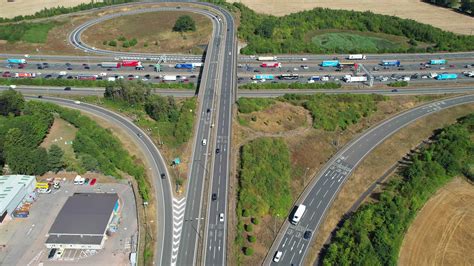 Aerial view of Busy Motorways with Traffic at England UK. 10850072 ...