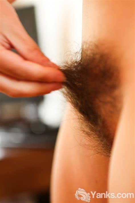 Playful Amateur Brunette Babe Nora Shows Off Her Hairy Bush 15 Photos