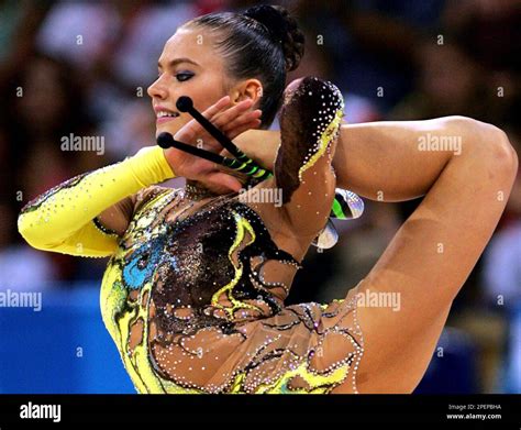 Russias Alina Kabaeva Performs With Clubs During The Final Of The